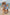 Meninas correndo na praia com look de praia combinando, uma de biquíni Vicky vestindo tamanho 6, e a outra com maiozinho olivia vestindo tamanho 2