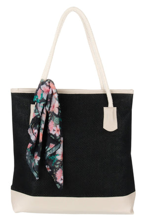 Lenço Estampado Floral amarrado em uma bolsa de praia, da Lili Sampedro Moda Praia Família